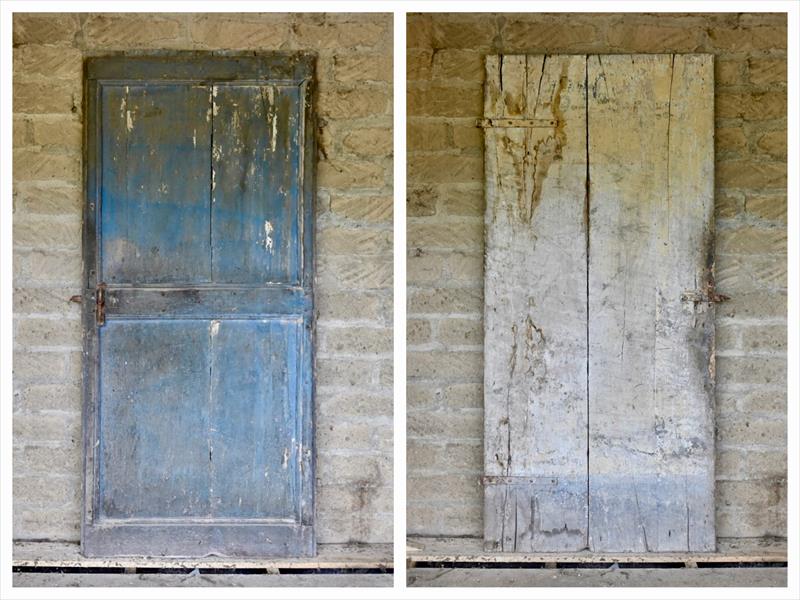 18th-century single-leaf door, the powder blue of the Umbrian countryside