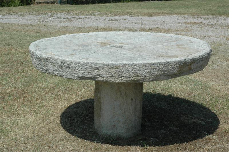 A strong, tireless stone. Once a millstone, now a table.