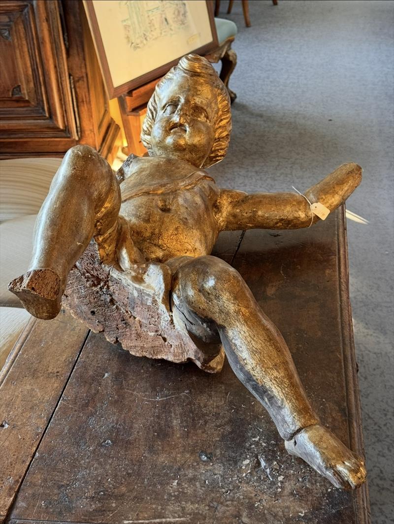 Putto secentesco in legno dorato